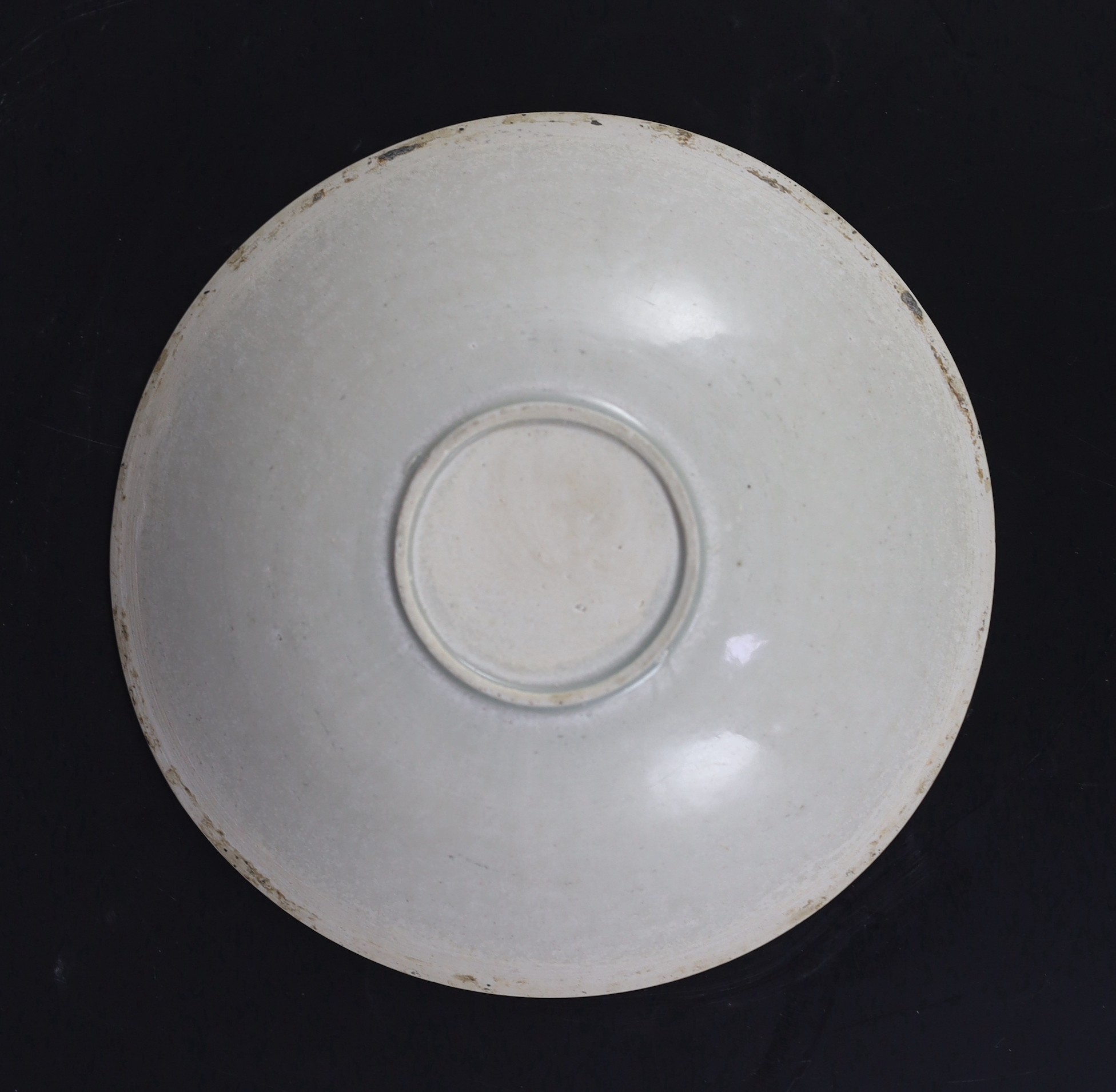 A Chinese Qingbai ‘Phoenix’ moulded dish, Yuan dynasty, 18.2 cm diameter